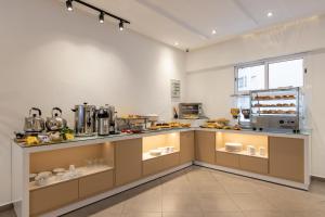 A cozinha ou kitchenette de Hotel Etoile Du Nord