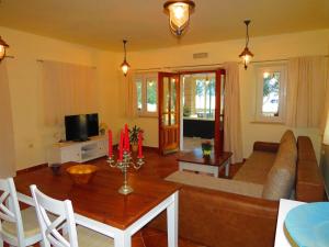 a living room with a couch and a table at House Villa Barakokula in Lumbarda