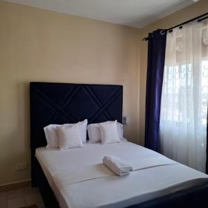 Postel nebo postele na pokoji v ubytování Classy homes