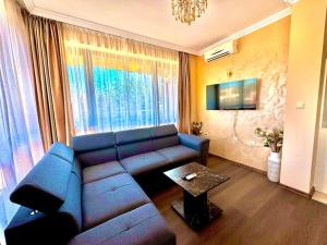 Μια τηλεόραση ή/και κέντρο ψυχαγωγίας στο Sea Sun Holiday Apartments