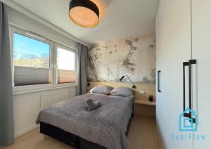 Katil atau katil-katil dalam bilik di Sailor Apartment- 10 minutes to Seaside & City Center Gdynia