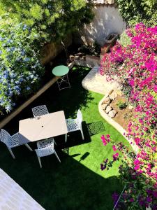 Κήπος έξω από το Appartement climatisé dans un quartier très calme