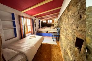 Posteľ alebo postele v izbe v ubytovaní Cinco Lunas VEGETARIAN Guesthouse
