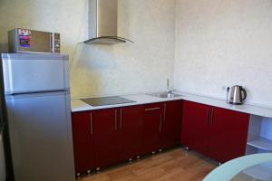 A kitchen or kitchenette at Apartment NG in the centre At Ivana Yarygina