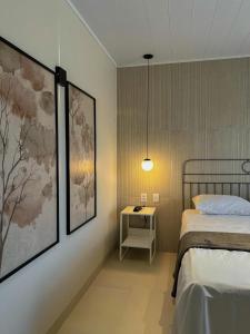 Ένα ή περισσότερα κρεβάτια σε δωμάτιο στο Hotel Flor de Lis