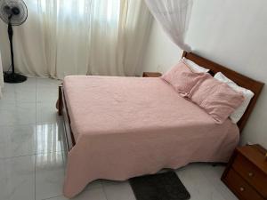 Postel nebo postele na pokoji v ubytování Casa dos Amigos