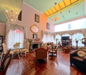 TV a/nebo společenská místnost v ubytování Residencial Belle Maison