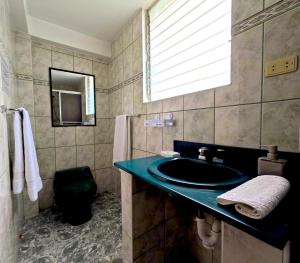 Koupelna v ubytování Residencial Belle Maison + 37 fotografií