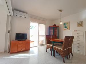 Un televizor și/sau centru de divertisment la Apartamento Bellavista