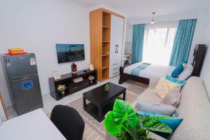 טלויזיה ו/או מרכז בידור ב-Dhahabu private Apartment