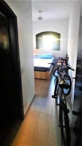 TV a/nebo společenská místnost v ubytování Sossego no Guarujá