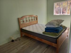 Postel nebo postele na pokoji v ubytování Casa parcela en Quilimari a 20 minutos de playa Pichidangui