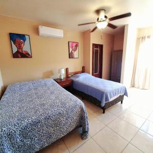 Postel nebo postele na pokoji v ubytování Como el Calor de tu hogar