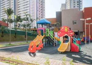 a playground with a slide in a park at Apto em Olímpia- Enjoy Solar das Águas Park Resort in Olímpia