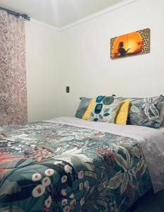 Katil atau katil-katil dalam bilik di Apartamentos Azapa