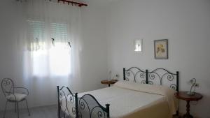 A bed or beds in a room at Andrea E Valentina