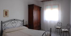 A bed or beds in a room at Andrea E Valentina