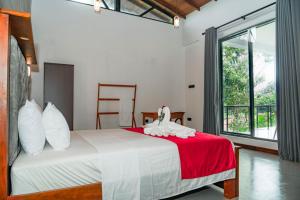 Postel nebo postele na pokoji v ubytování Nuva Villa Tangalle