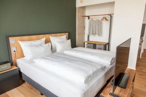Staycity Aparthotels Leipzig City Centre客房内的一张或多张床位