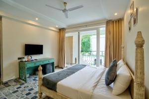 Fotografie z fotogalerie ubytování Goa Courtyard by the porto Arpora v destinaci Baga