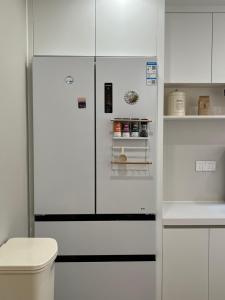 A kitchen or kitchenette at A cozy homestay for families near the East Station