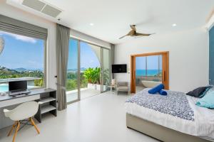 Postel nebo postele na pokoji v ubytování Villa Cocoon + 37 fotografií