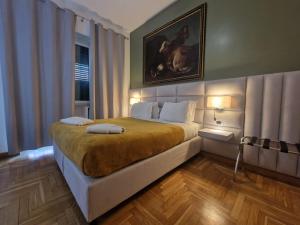 Posteľ alebo postele v izbe v ubytovaní Sweet Home Parioli