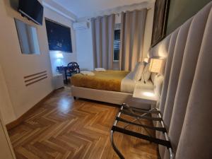 Posteľ alebo postele v izbe v ubytovaní Sweet Home Parioli