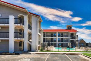 a building with a parking lot in front of it at La Quinta Inn by Wyndham Amarillo West Medical Center in Amarillo