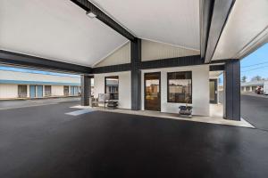 a large empty parking lot in a building at Rodeway Inn & Suites Brookhaven in Brookhaven