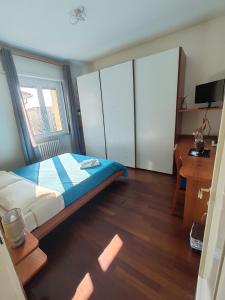 Postel nebo postele na pokoji v ubytování Stanza Maggiore + 37 fotografií