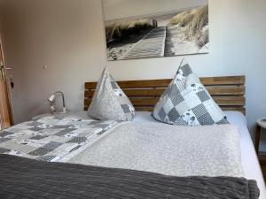 Postel nebo postele na pokoji v ubytování Lichtdurchflutete Wohnung