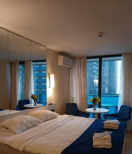 Postel nebo postele na pokoji v ubytování PARAGON HOTEL - Orbi City + 37 fotografií
