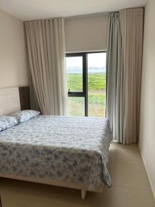 Ένα ή περισσότερα κρεβάτια σε δωμάτιο στο Sky serenity two rooms apartment
