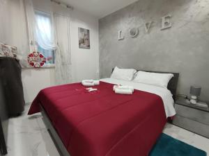 En eller flere senge i et værelse på La casetta di Davide