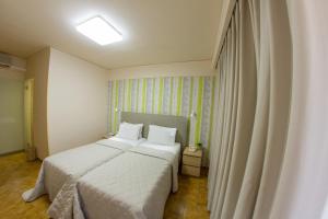 Postel nebo postele na pokoji v ubytování Hotel Pitsakis