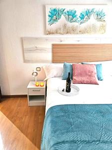 En eller flere senge i et værelse på Apartamento Logroño Ayuntamiento, centro y familiar