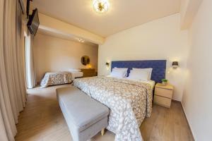 Postel nebo postele na pokoji v ubytování Hotel Pitsakis + 25 fotografií