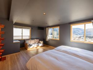 Kawaguchiko Country Cottage Ban客房内的一张或多张床位