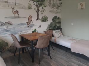 Postel nebo postele na pokoji v ubytování b&b de Wensput