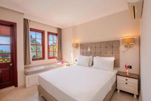 Postel nebo postele na pokoji v ubytování Alize Hotel Oludeniz - All Inclusive + 37 fotografií