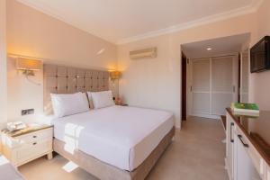 Postel nebo postele na pokoji v ubytování Alize Hotel Oludeniz - All Inclusive