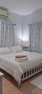 Postel nebo postele na pokoji v ubytování B&N House