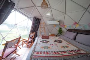Postel nebo postele na pokoji v ubytování Cha-om camping ชะอม แคมป์ปิ้ง