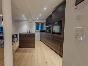 Kuchyň nebo kuchyňský kout v ubytování Koller Sapuen by Arosa Holiday
