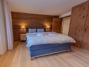 Postel nebo postele na pokoji v ubytování Koller Sapuen by Arosa Holiday