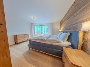 Postel nebo postele na pokoji v ubytování Koller Sapuen by Arosa Holiday