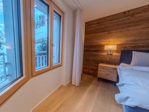 Postel nebo postele na pokoji v ubytování Koller Sapuen by Arosa Holiday