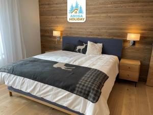 Postel nebo postele na pokoji v ubytování Koller Sapuen by Arosa Holiday