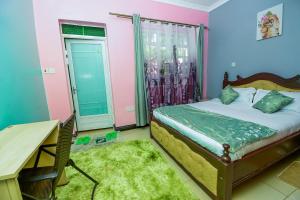 A bed or beds in a room at The Gems Resort